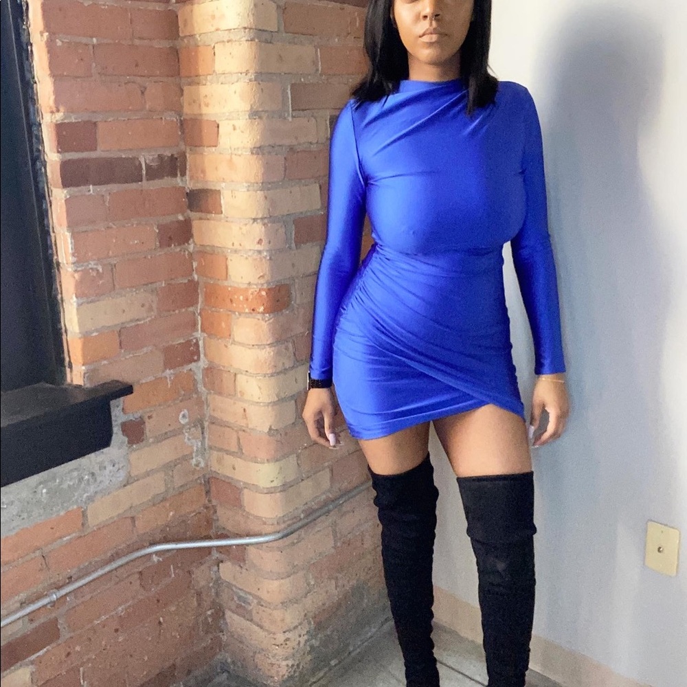 Very stretchy material , this dress hides a lot of imperfections . Worn 3 times